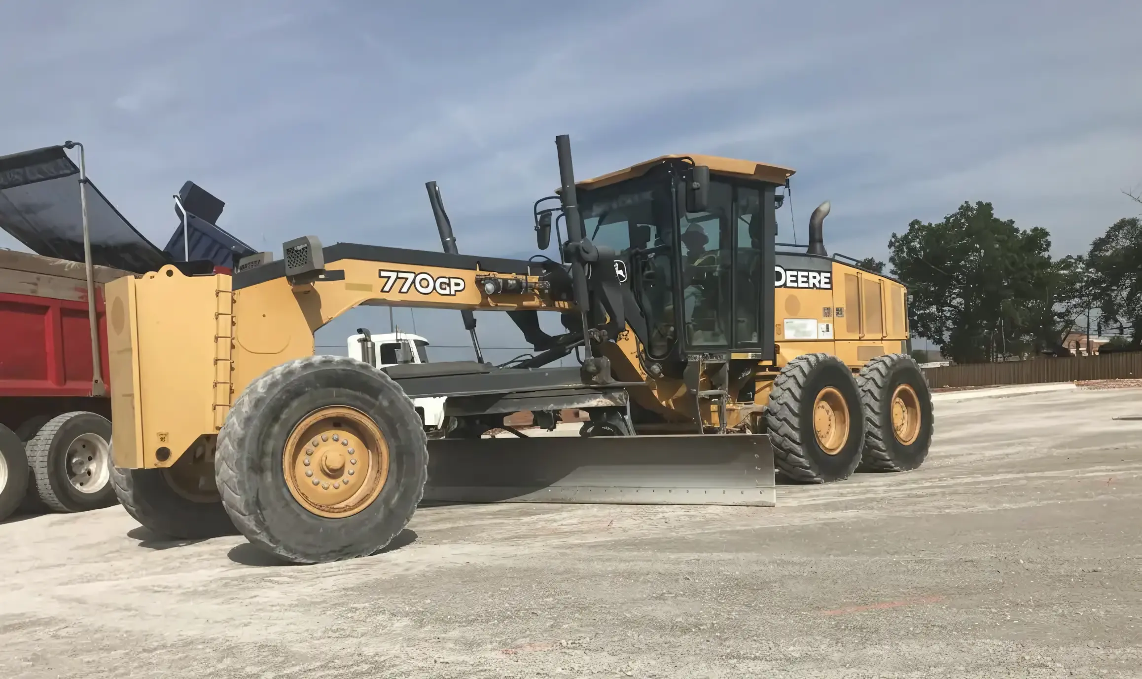 Professional aggregate base installation and fine grading by Tomlinson Asphalt showing quality base preparation