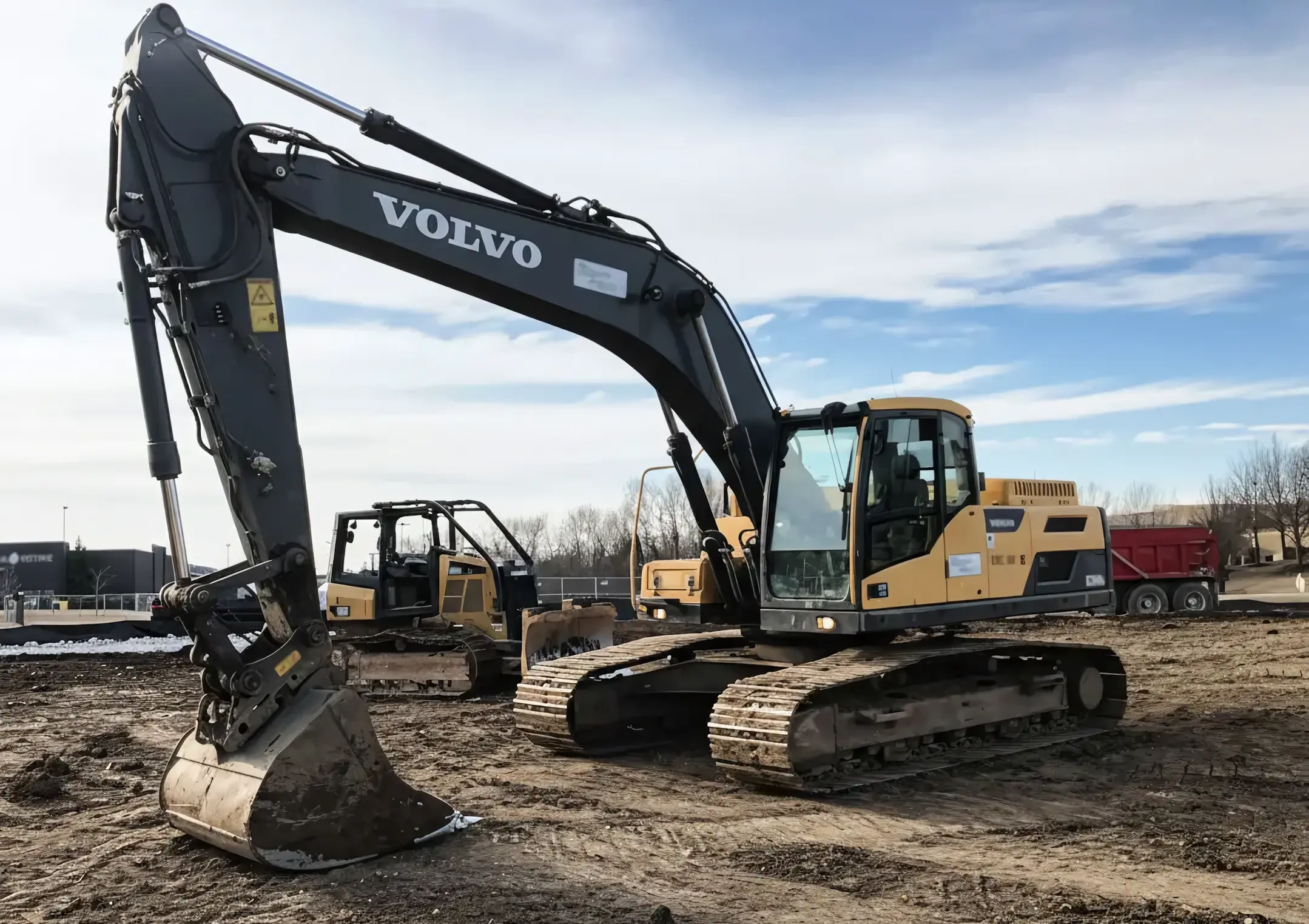 Professional earthwork and grading operations by Tomlinson Asphalt showing heavy equipment at work