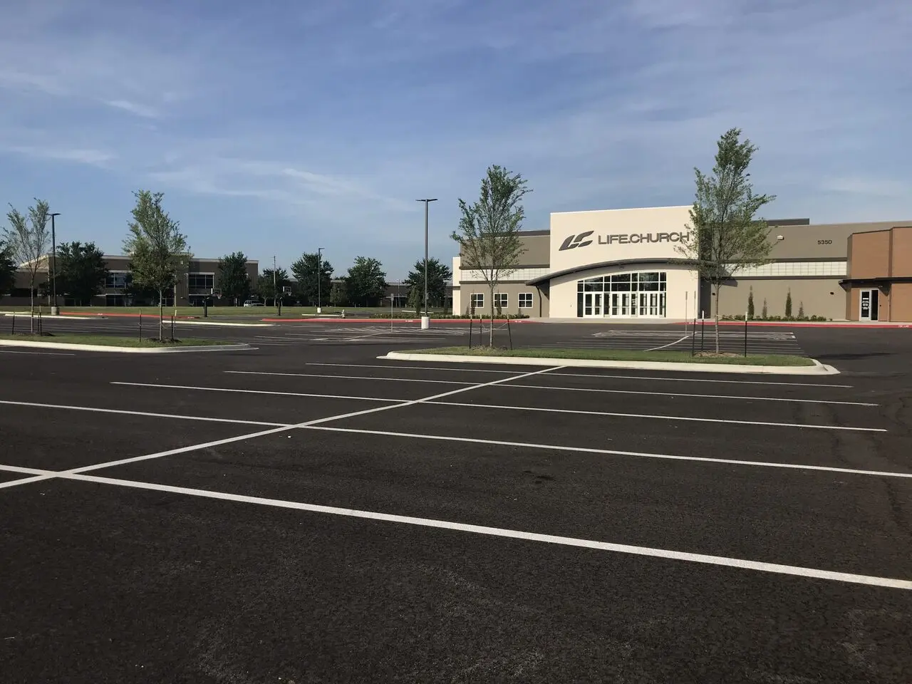 Parking lot paving and striping at Life Church in Rogers, AR