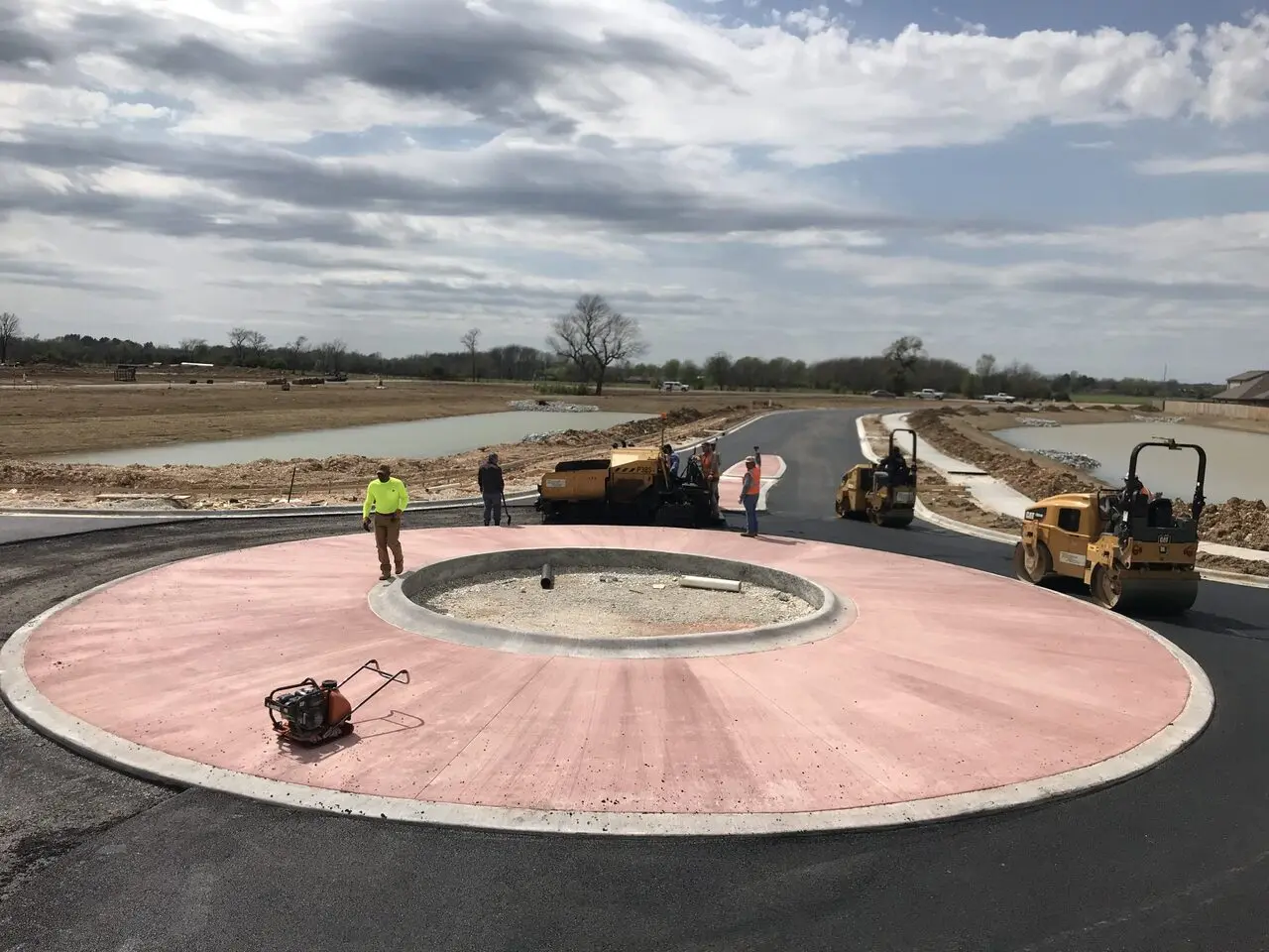 Sloan Brooke Phase V subdivision paving and concrete roundabout in Springdale, AR